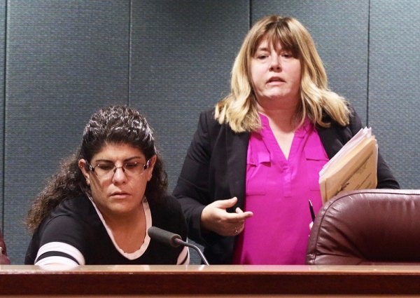 Lemoore City Councilmember Holly Blair confers with City Attorney Jenell Van Bindsbergen at Lemoore City Council Special Meeting held Thursday, April 25 in Lemoore City Hall.